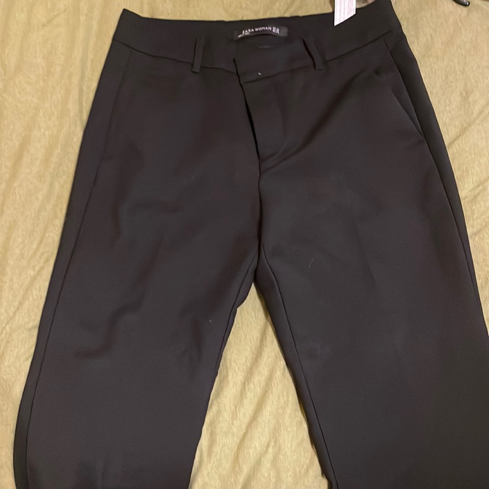 Zara black dress pants. Ankle length shorter in front than back.